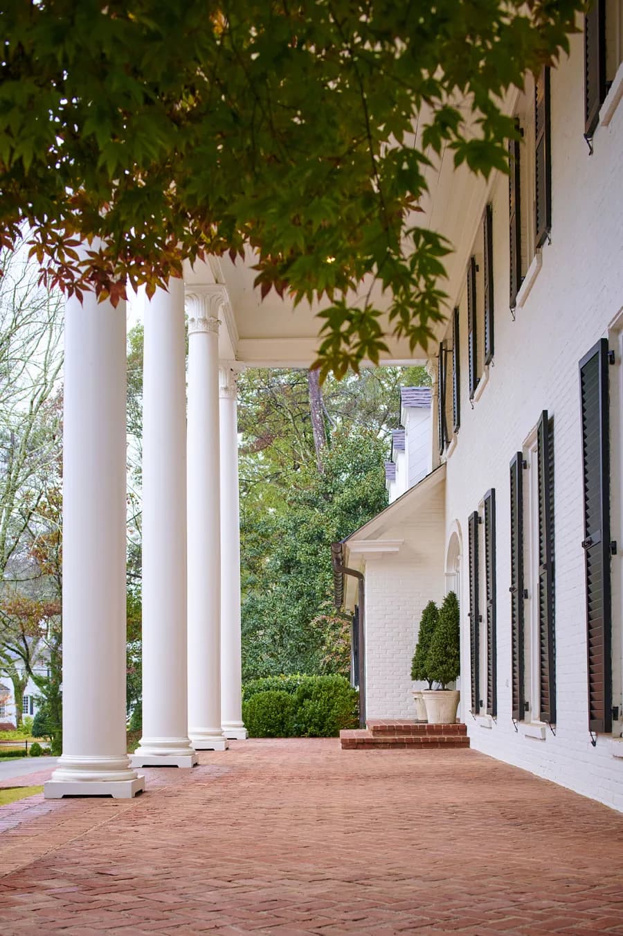A home with a broad covered porch and welcoming front entry